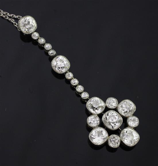 An Edwardian silver and gold, diamond cluster drop pendant, pendant 60mm.